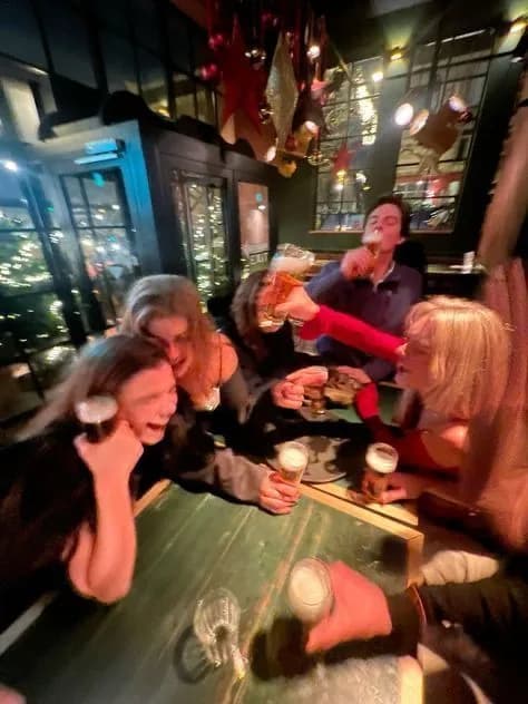 Friends talking around a table