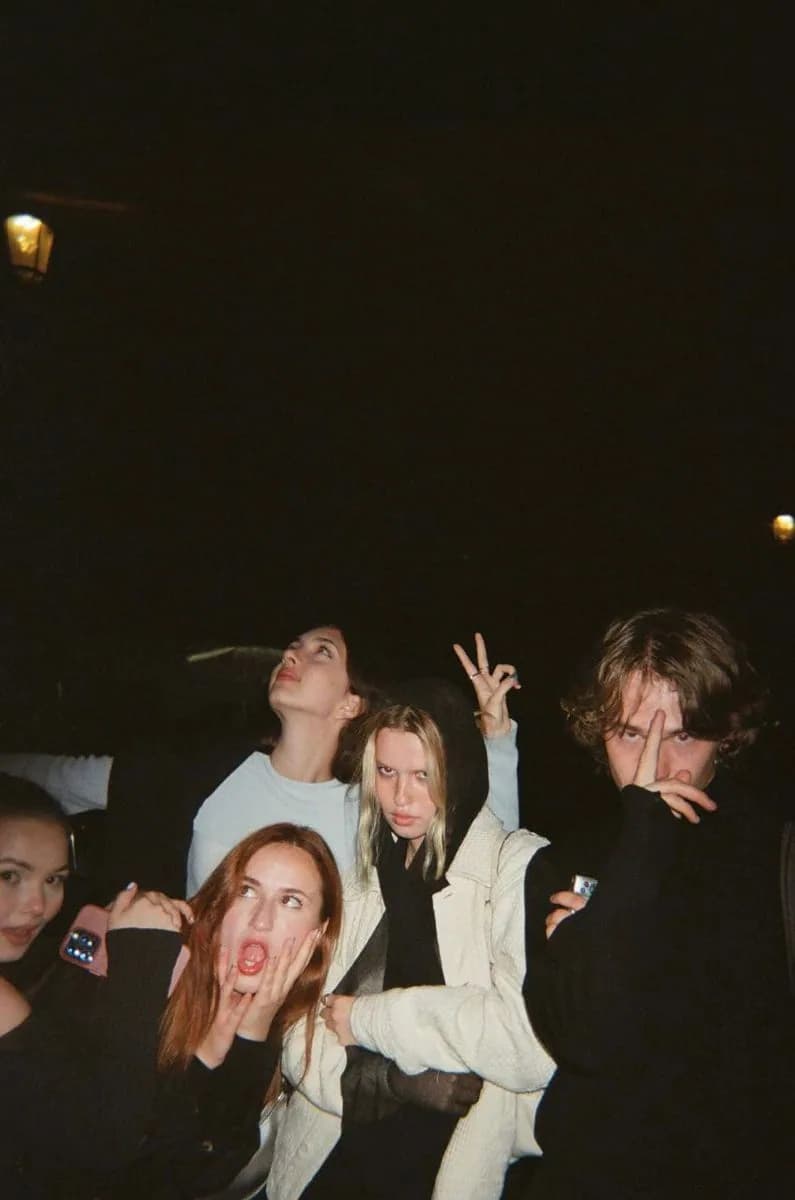 Friends posing during a night out